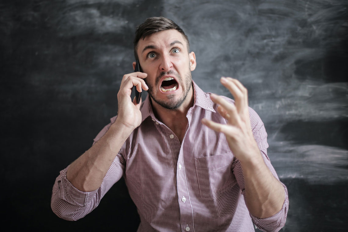 An Angry Tenant Is Yelling On A Phone